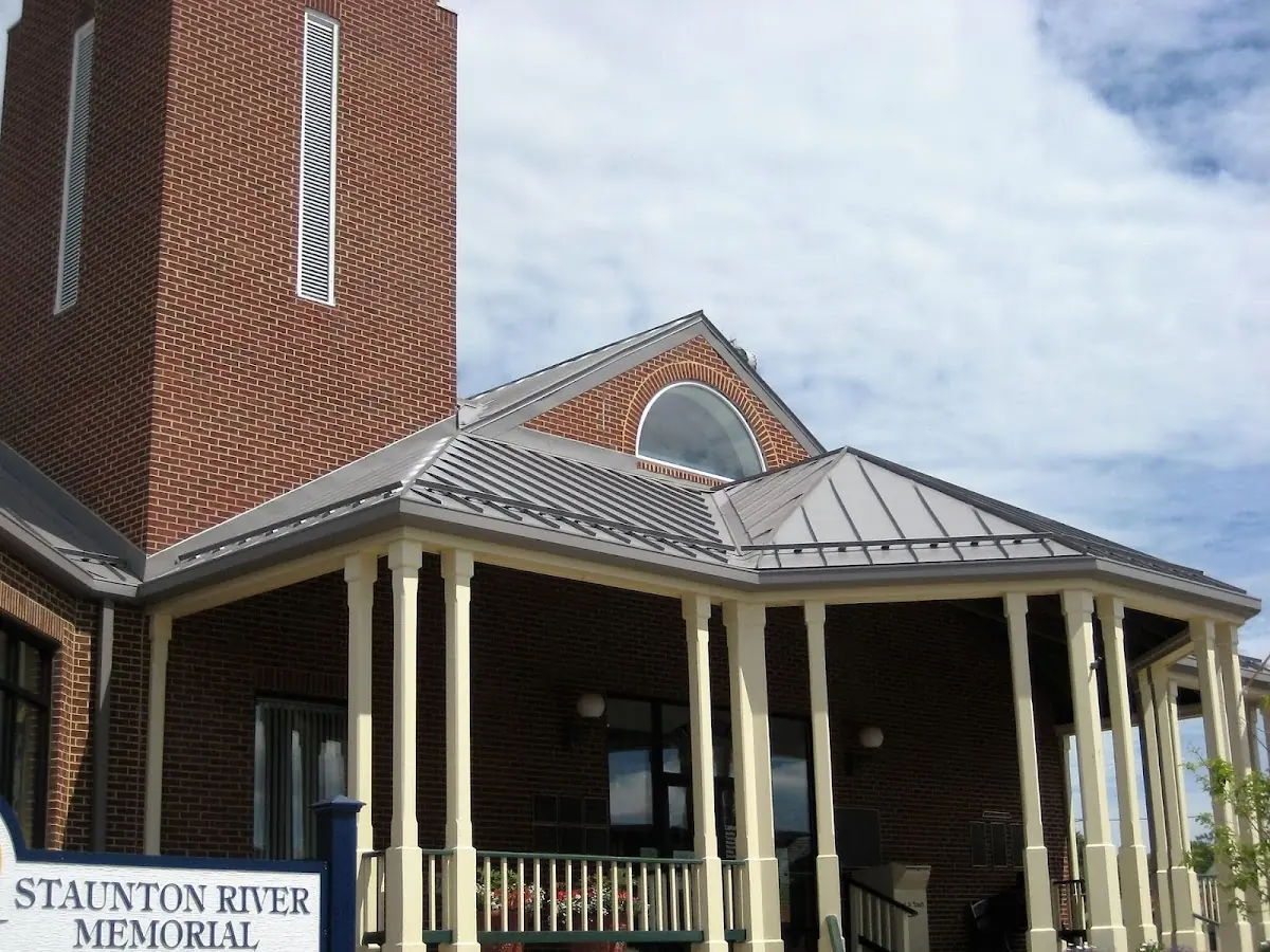 Skilled roofing craftsmen working on a residential roof in Lancaster